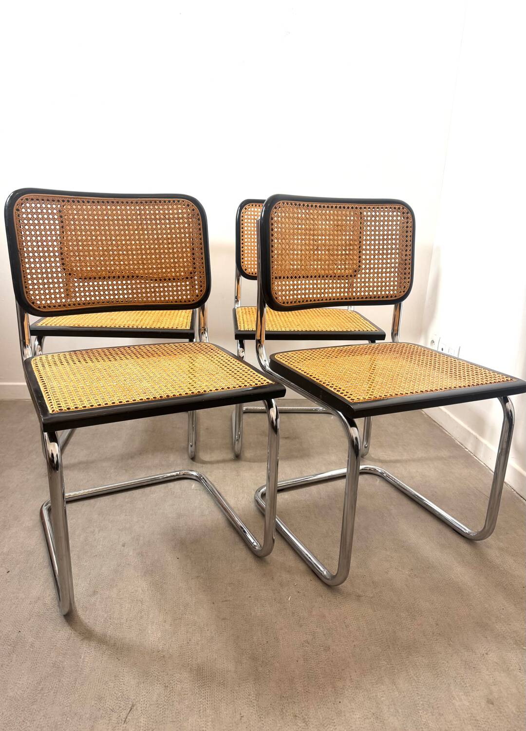 Set of four Marcel Breuer Cesca chairs made in Italy.