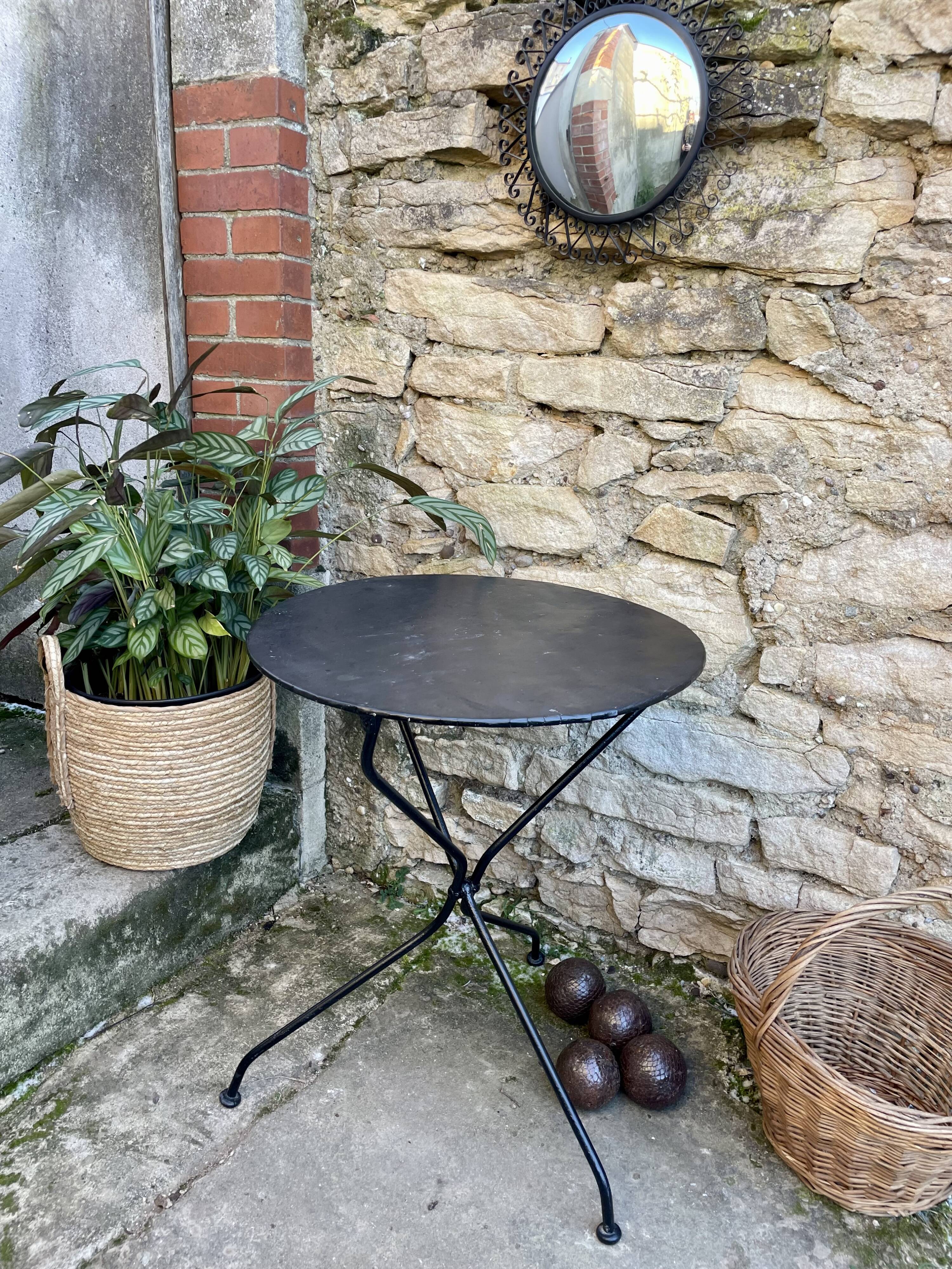 Iron pedestal table