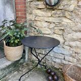 Iron pedestal table