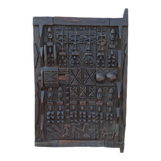 Old wooden door of attic millet African art Dogon ethnic group of Mali