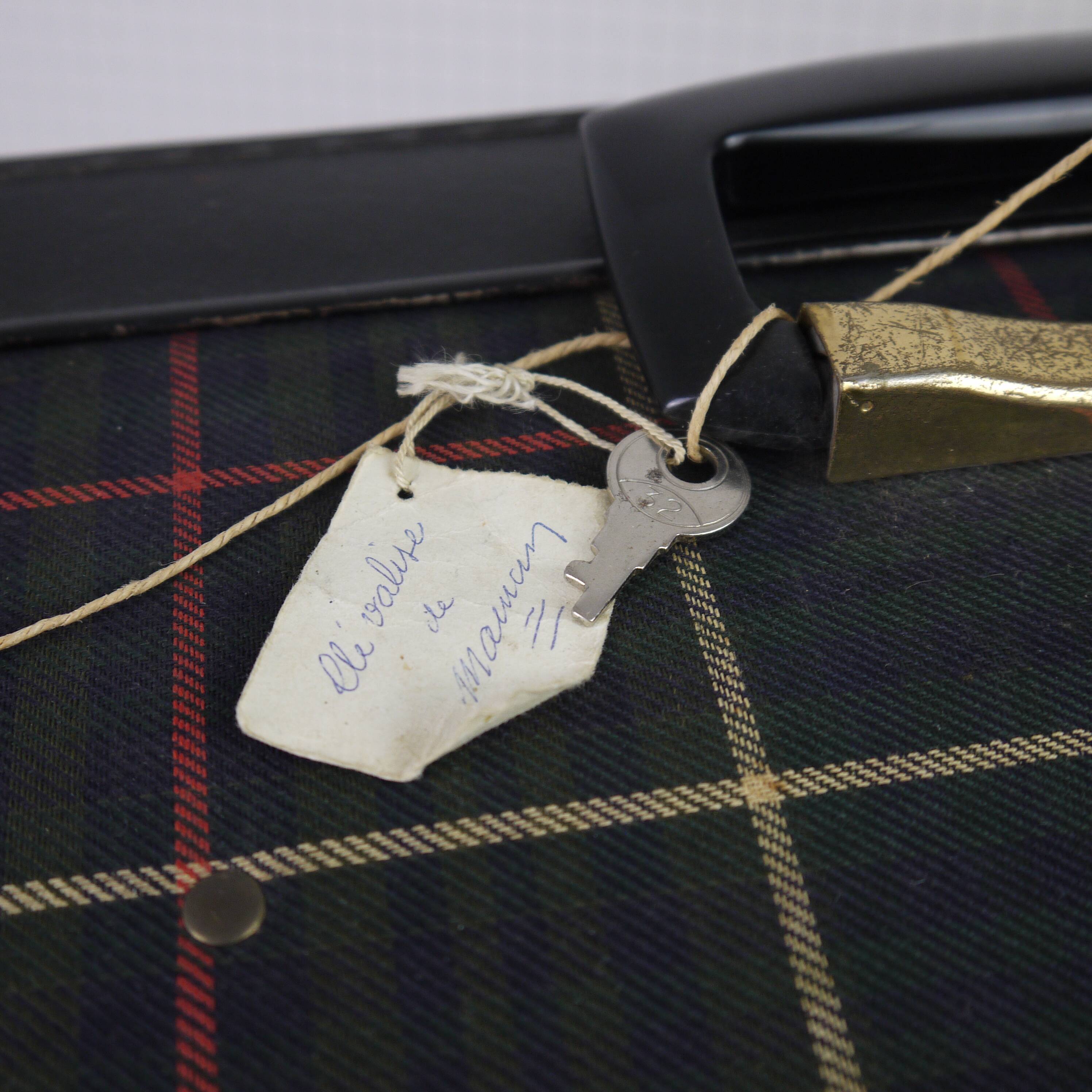 Green scottish fabric case with key