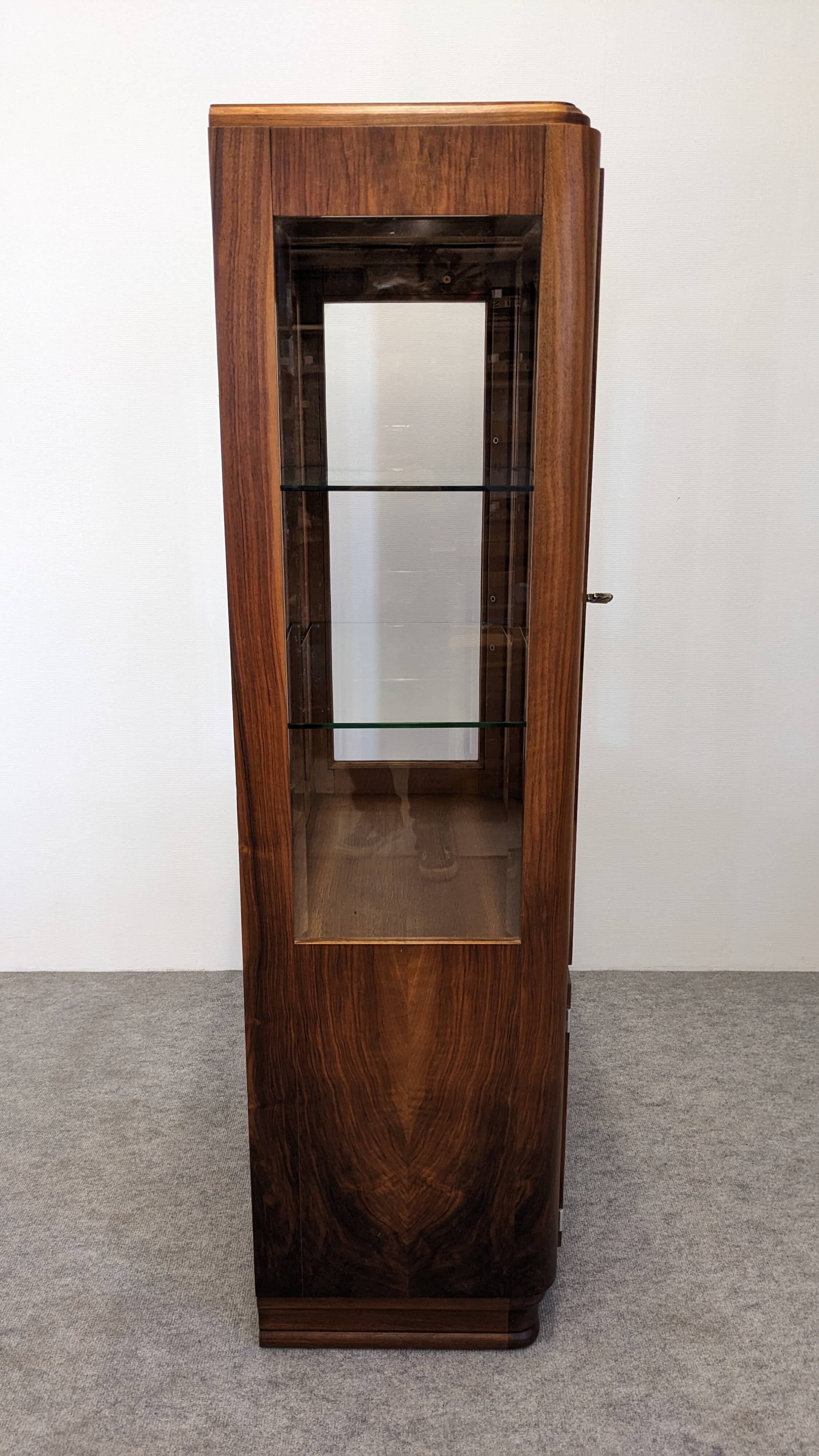 Art Deco walnut burl display cabinet, France circa 1930.
