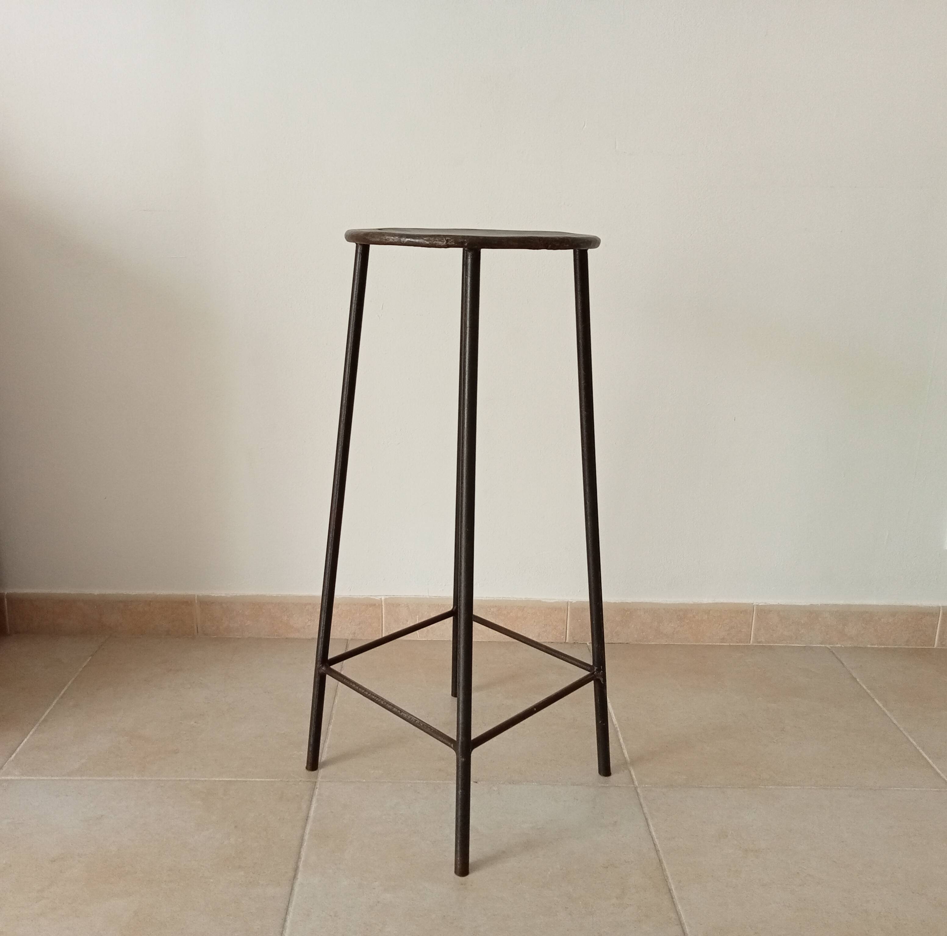 Brutalist high stool from the 1960s in solid steel.