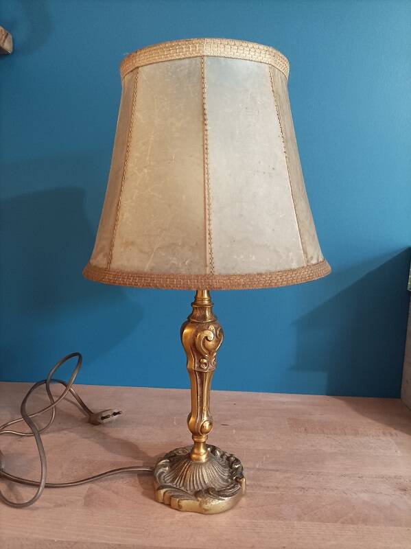 Living room lamp with golden bronze base and shade