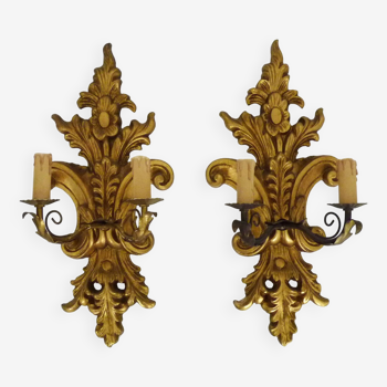 Pair of vintage Italian wall lights with 2 lights in gilded wood and arms. 55cm - 21.65"