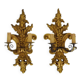 Pair of vintage Italian wall lights with 2 lights in gilded wood and arms. 55cm - 21.65"