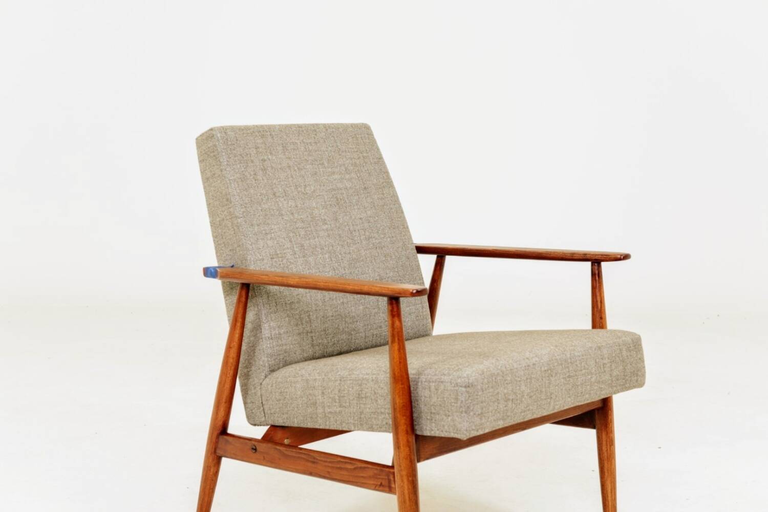 Beige mixed vintage armchair from the 1970s.