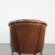 Comfortable club chair made of sheepskin leather