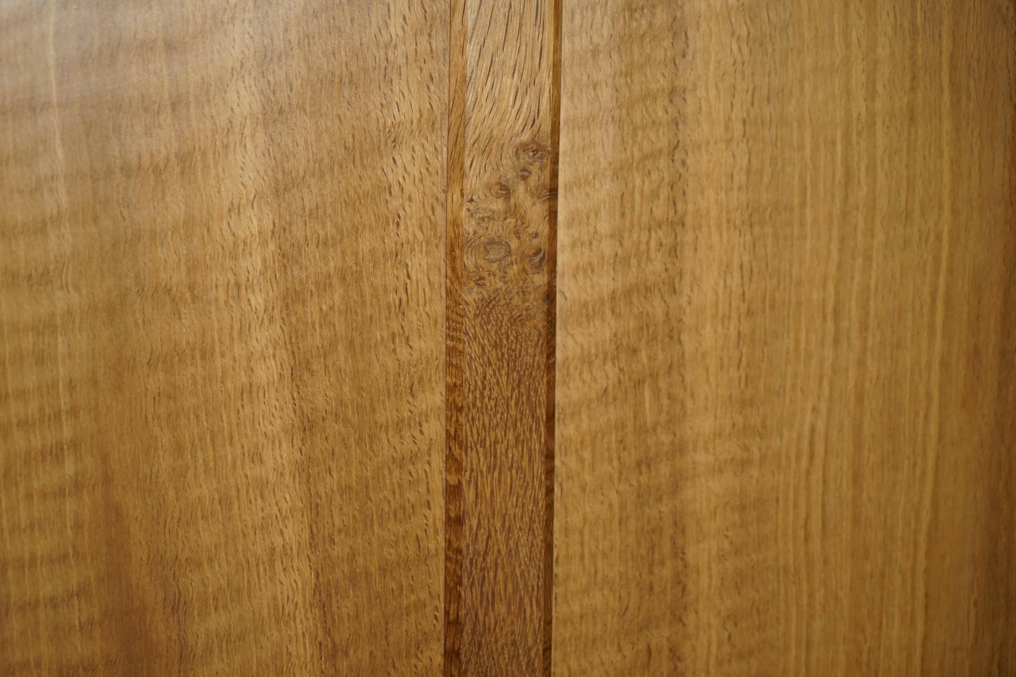 Pair of Robert Mouseman Thompson oak carved bookshelves.