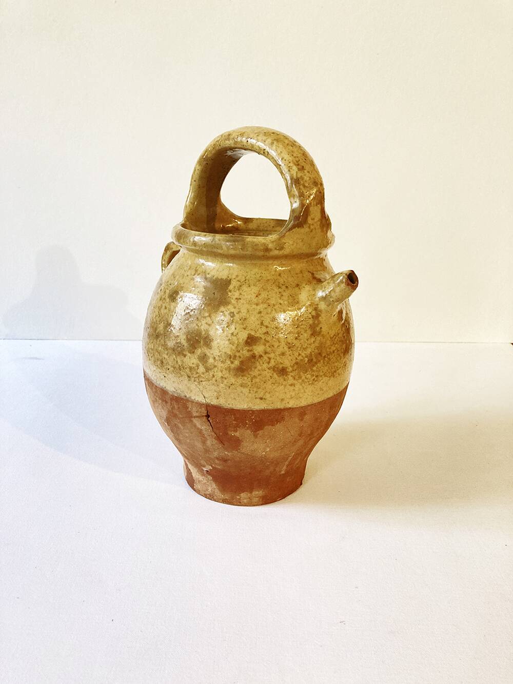 Antique Provençal jug / goat in yellow enamelled stoneware