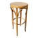 High bar stool in curved wood and cane