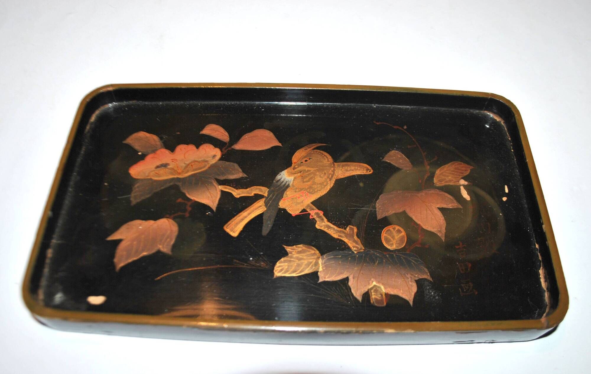 Set of two brown and black Chinese lacquer trays with bird decor