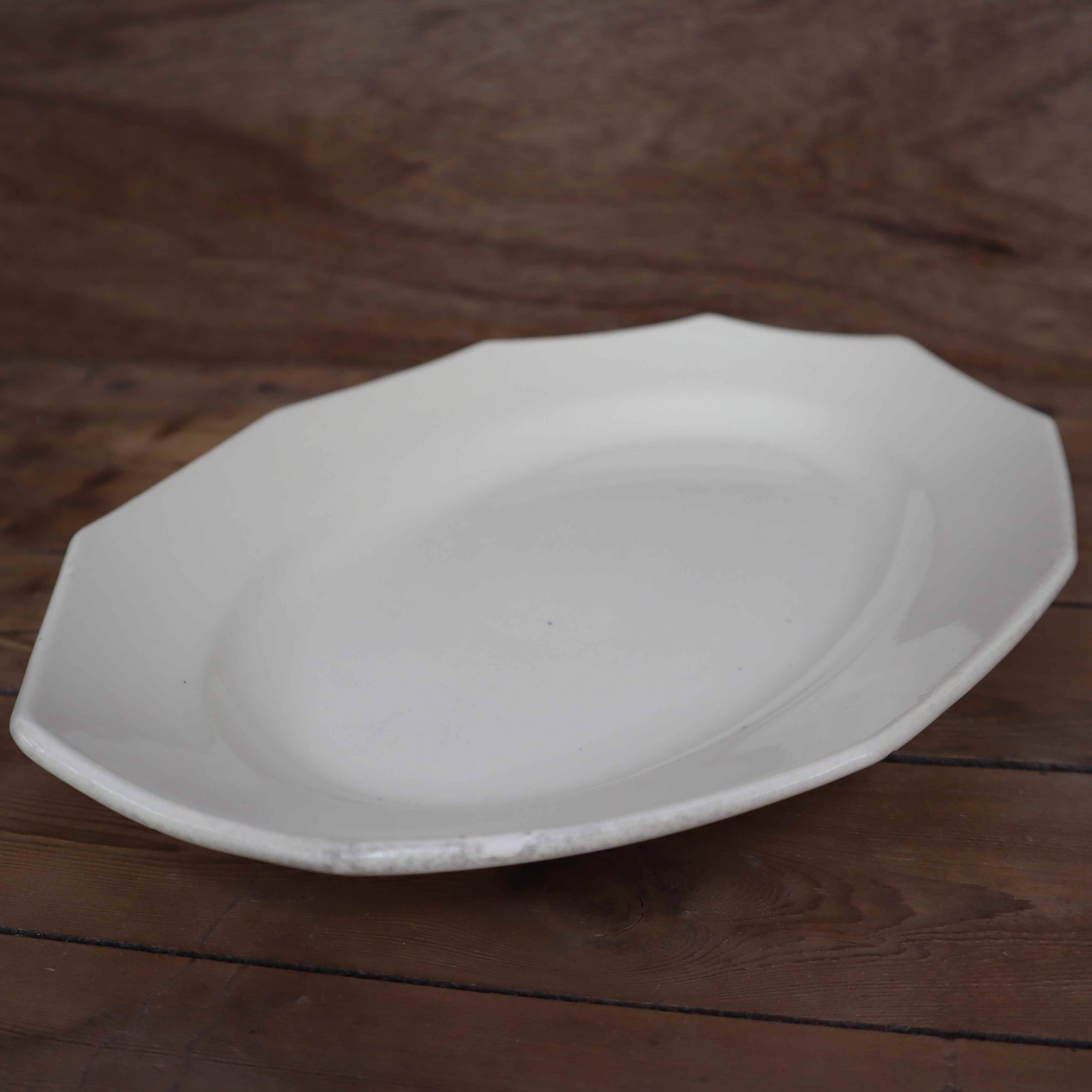 Oval octagonal dish in ecru white earthenware Moulin des Loups