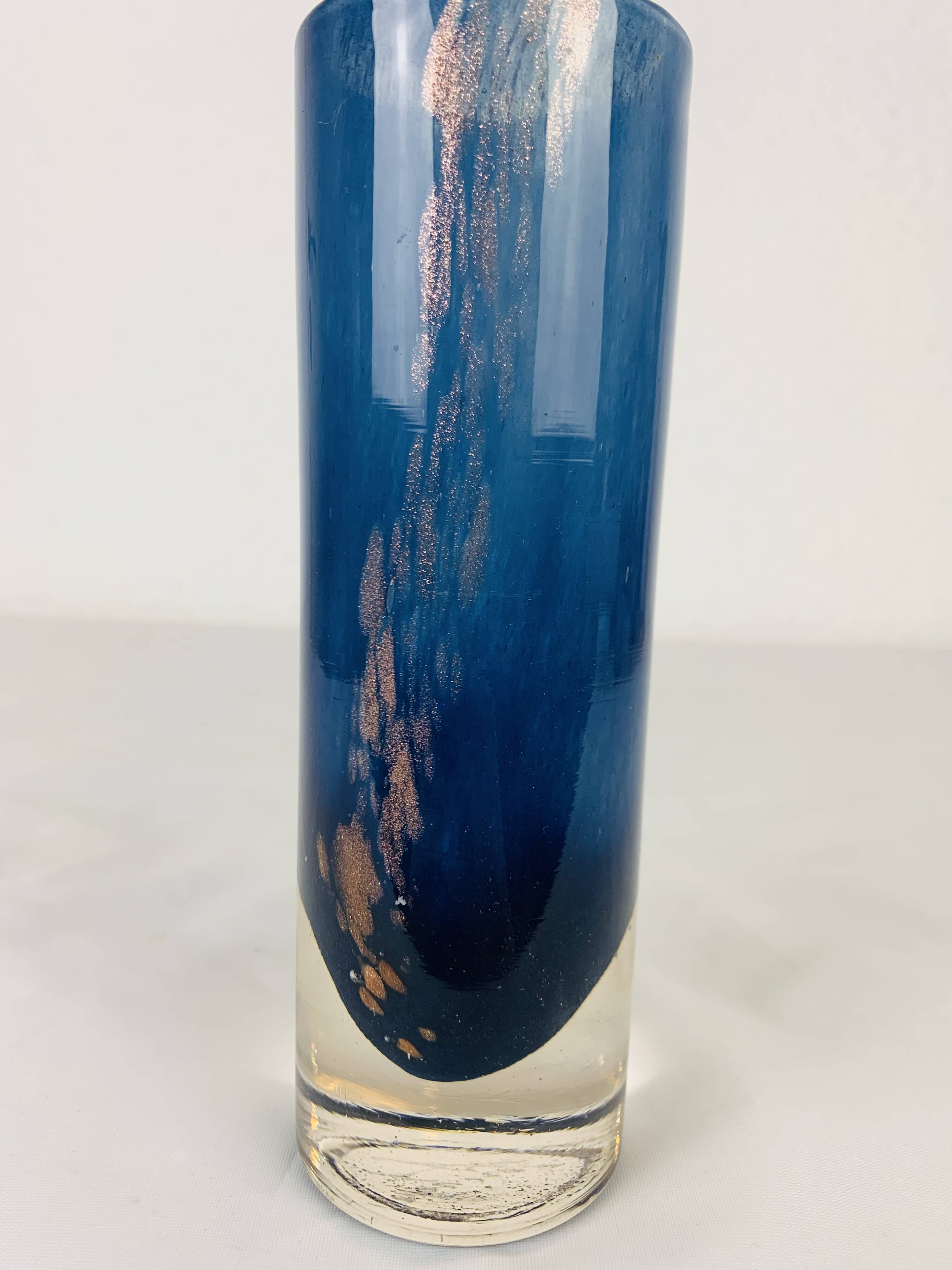 Vintage blue glass roller vase