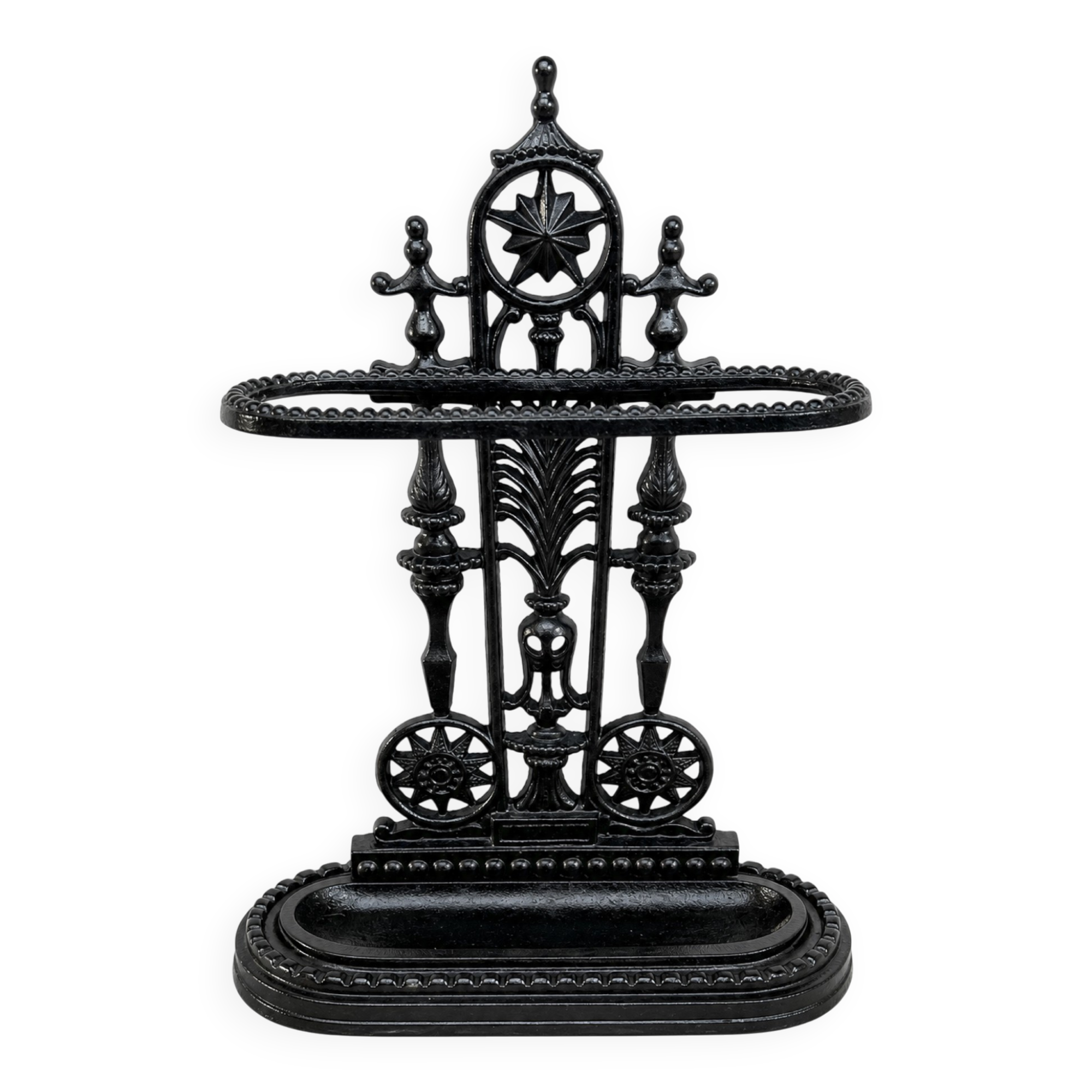 Antique cast iron umbrella stand, star-shaped openwork decoration, Victorian style.