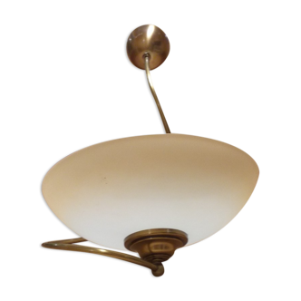Pendant light in brass and tempered glass