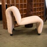 Armchair Étienne Fermigier and its ottoman