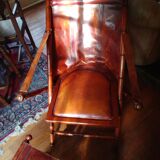 Leather folding armchair and footwork