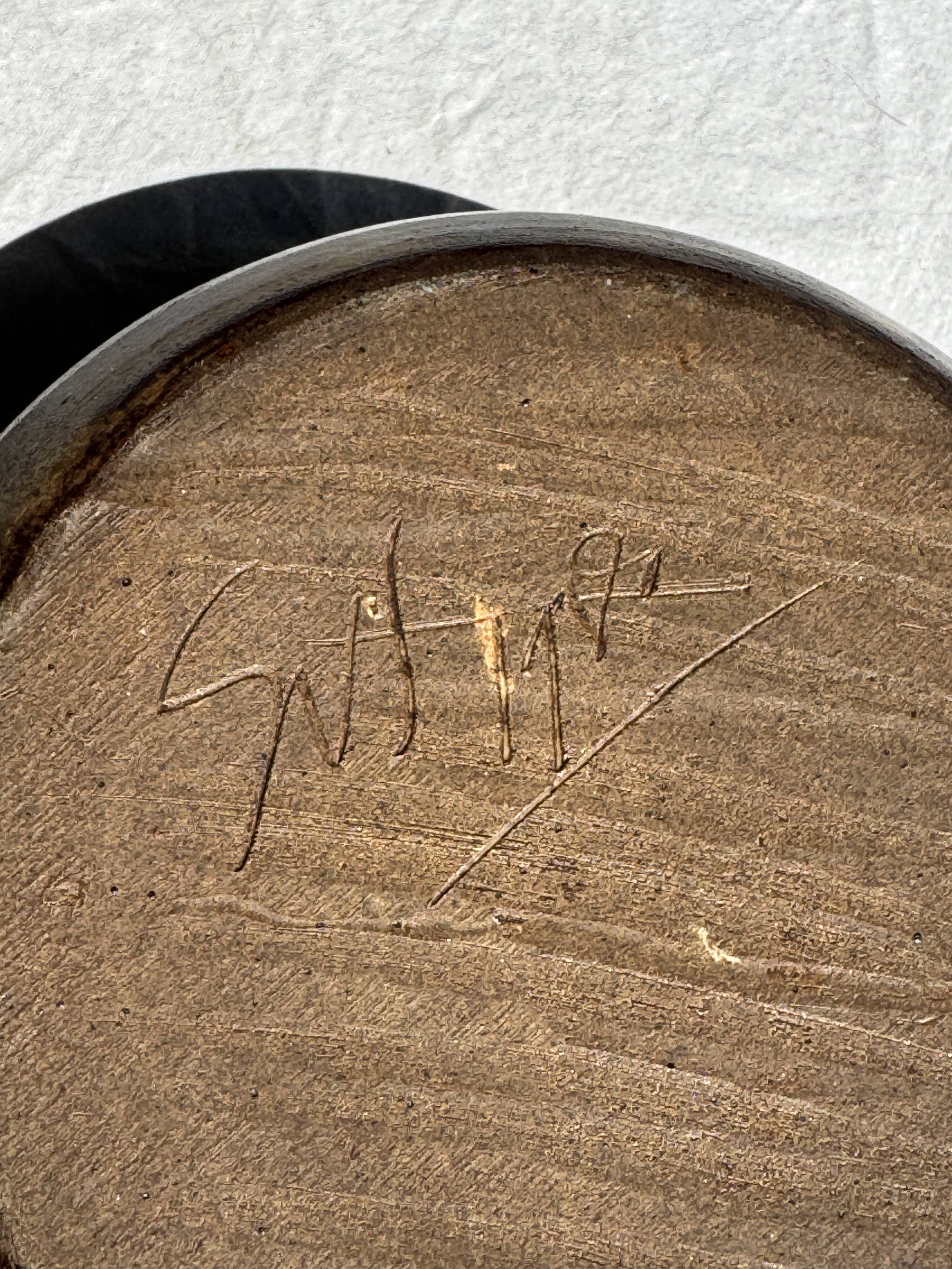 A small stoneware bowl, brown exterior, speckled grey interior D15