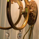 Old brass wall lamp with grapevines