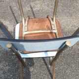 2 sky blue Formica chairs