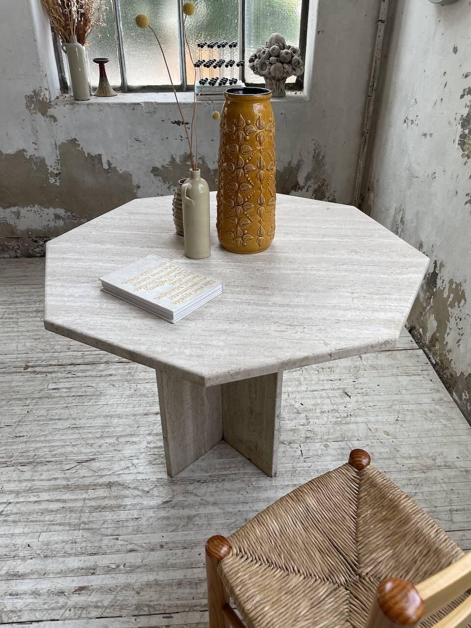 Octagonal travertine coffee table