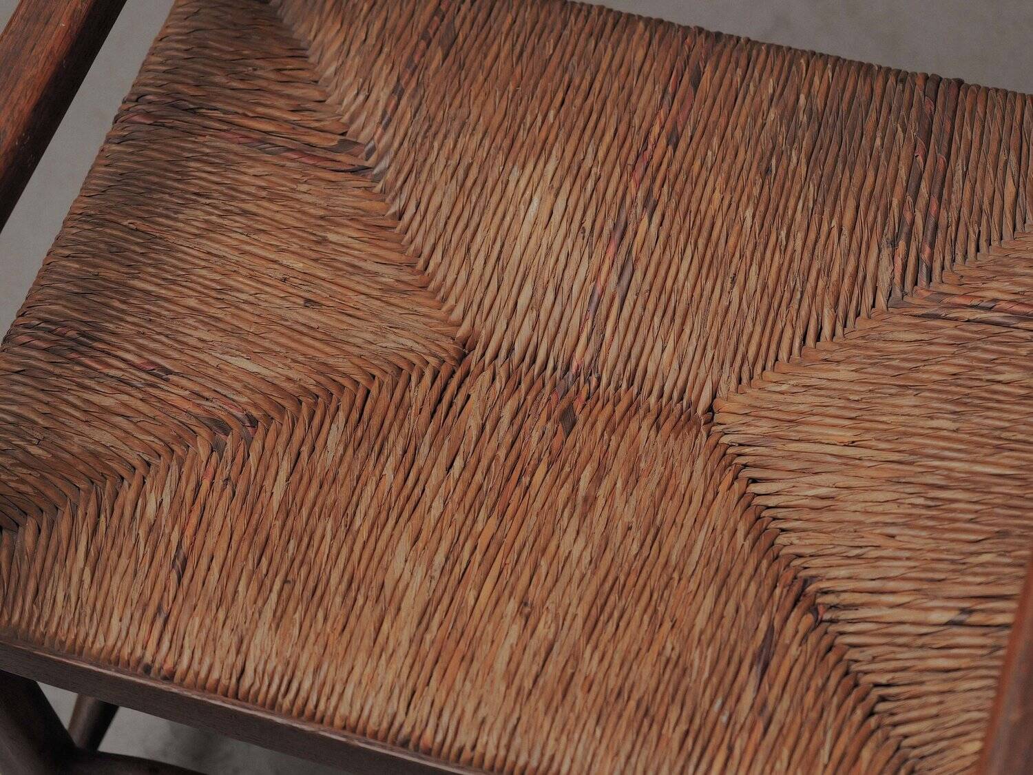 Wicker armchair in solid wood, handcrafted, France, around 1950.
