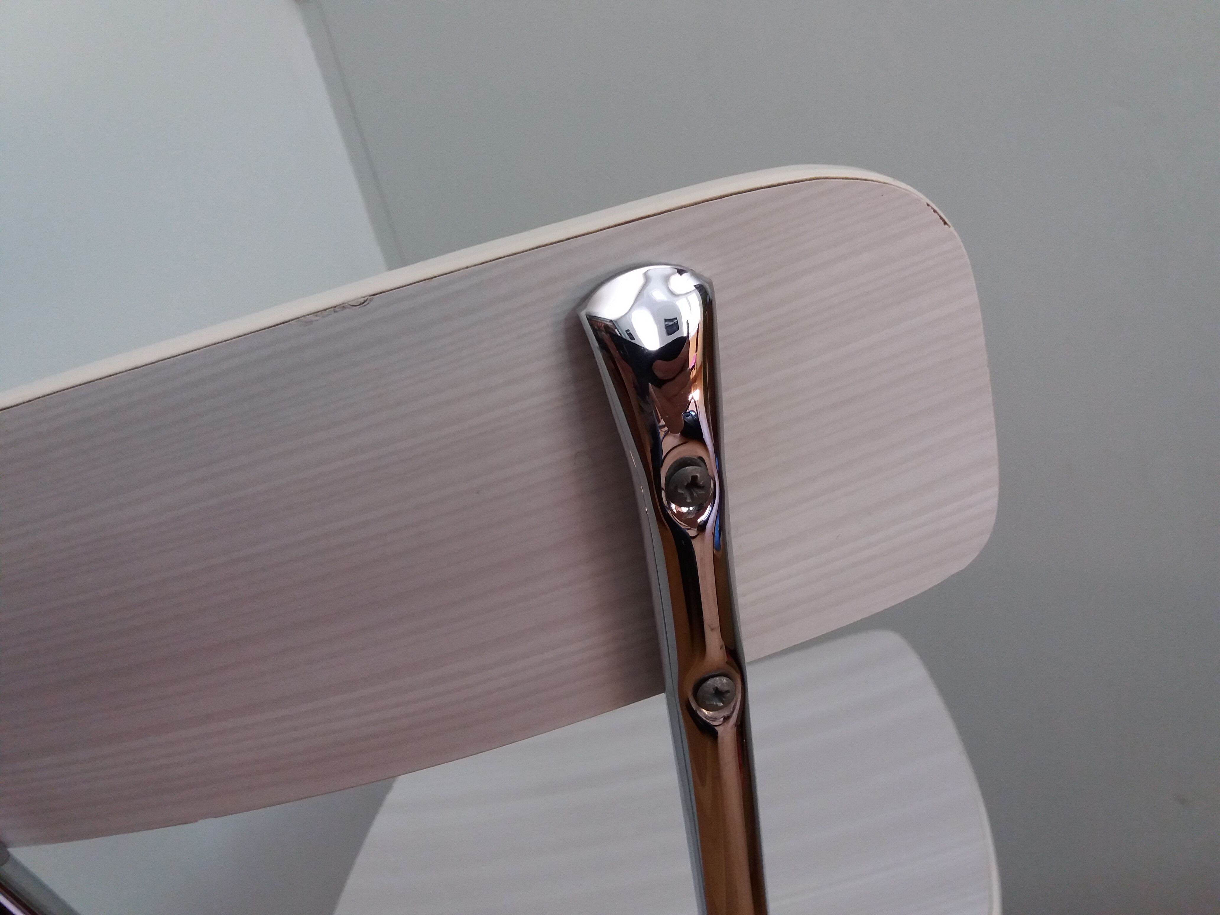 Chrome metal chair and formica white striped gray