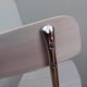 Chrome metal chair and formica white striped gray
