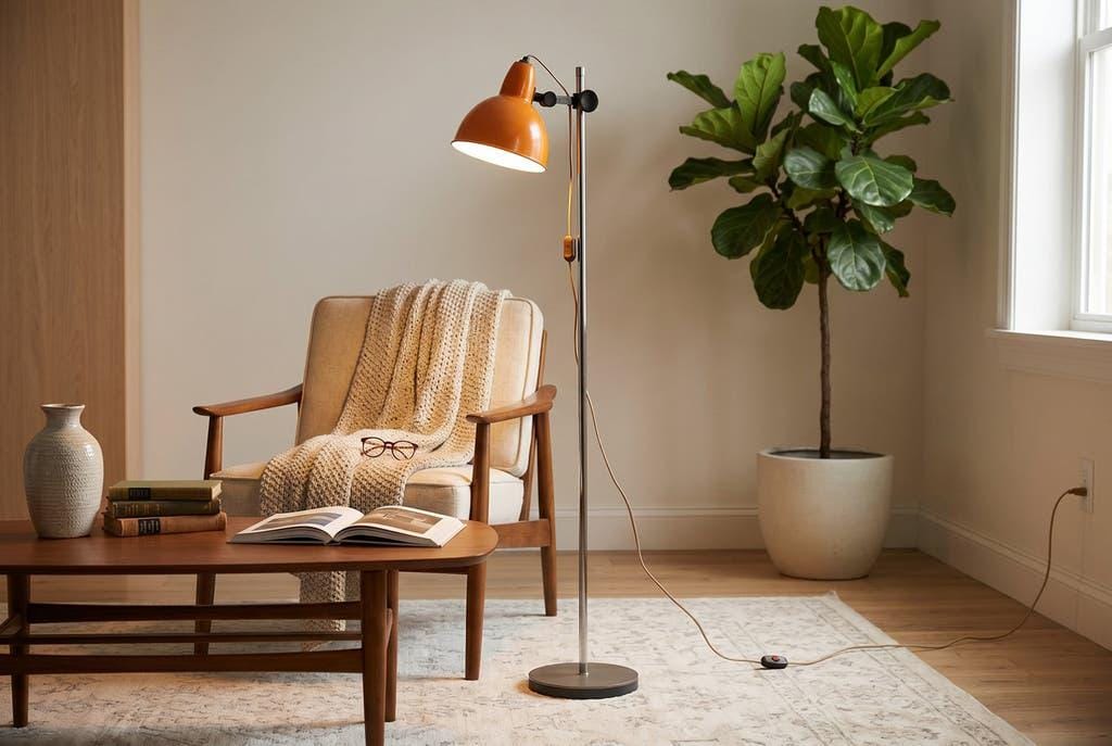 Vintage orange-red floor lamp with chrome.