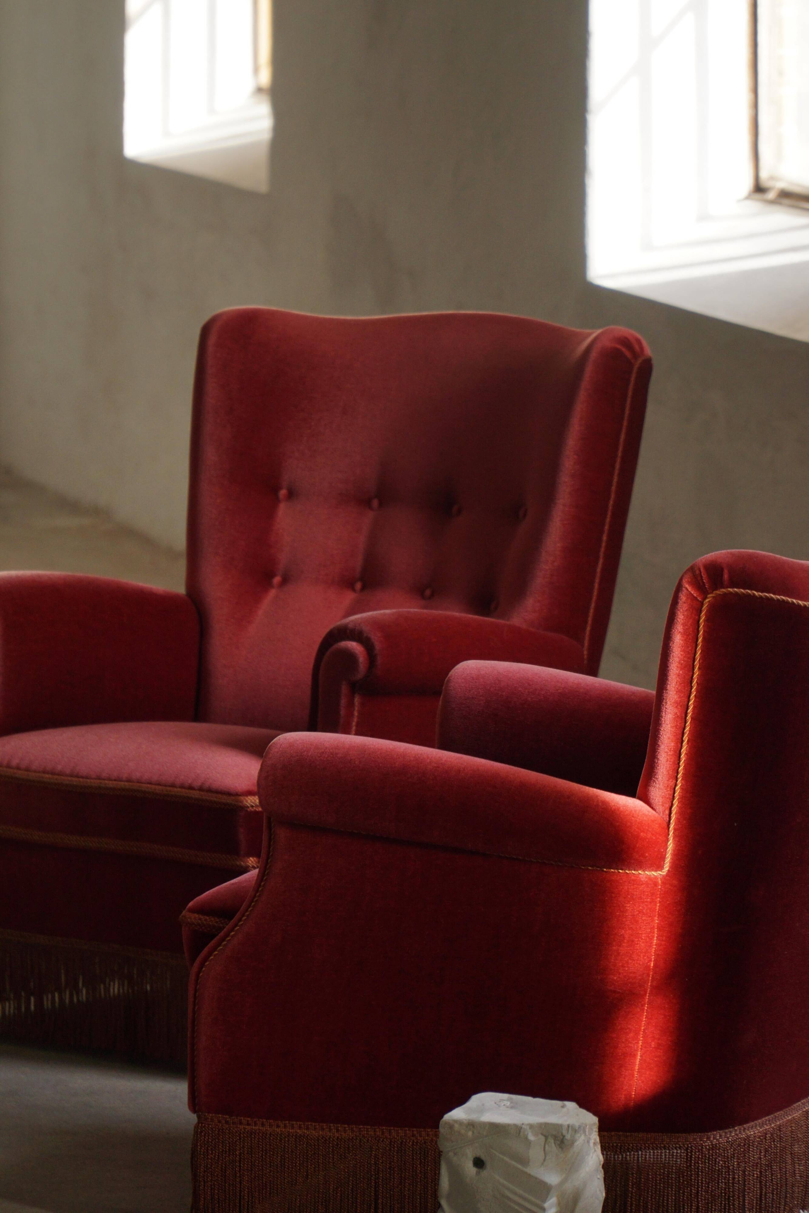 Pair of modern Danish lounge chairs, cherry red velvet, 1950s