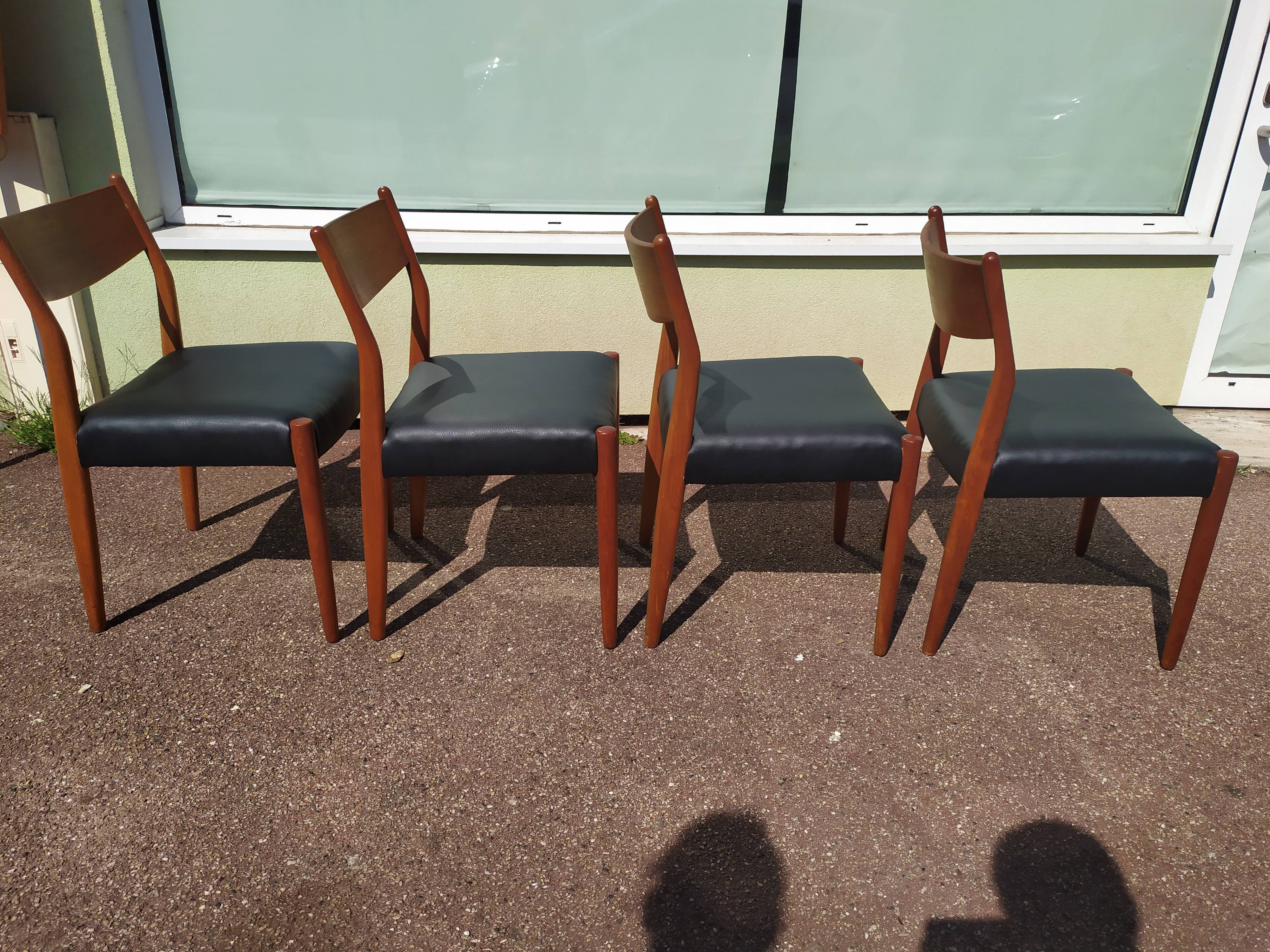 Set of 4 Scandinavian teak chairs in black leather