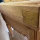 Genuine butcher's block made of solid wood with a knife drawer.
