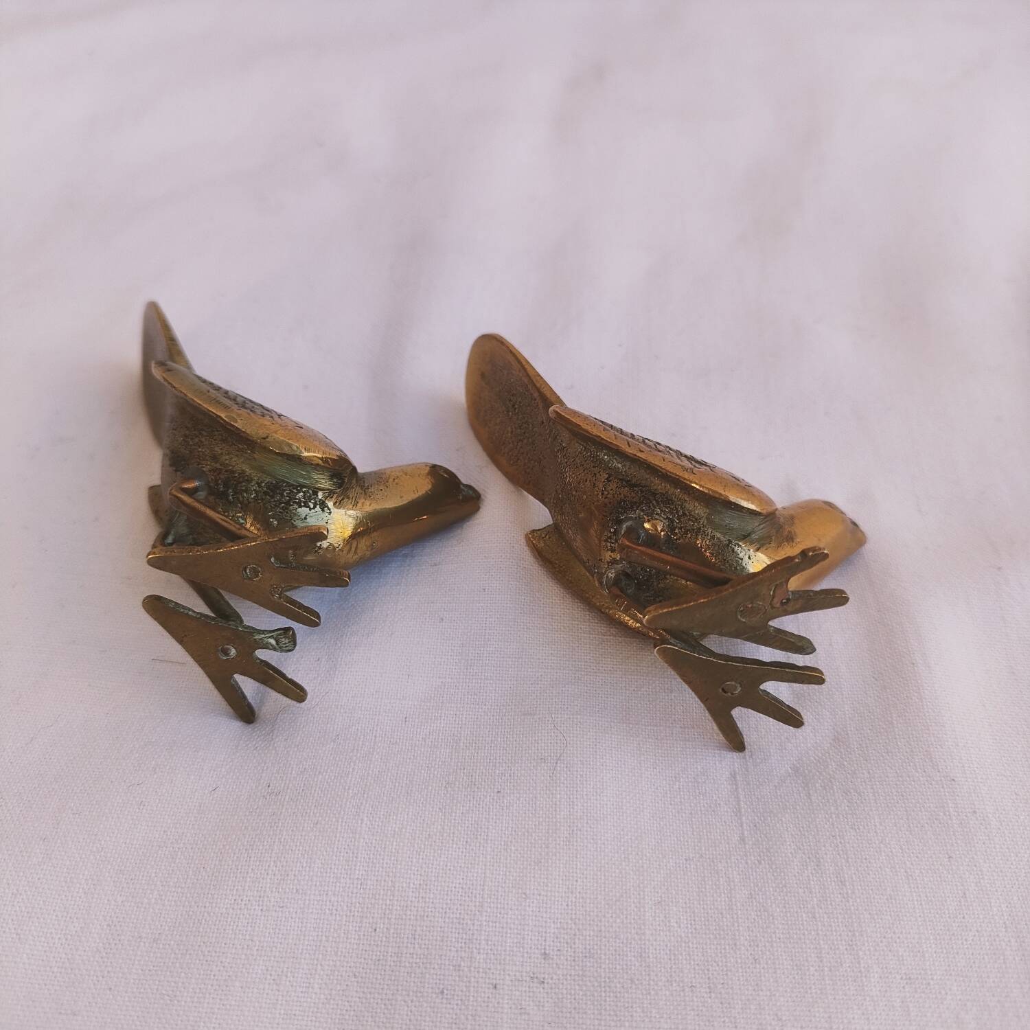 Pair of small brass birds