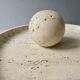 Large cup and its sphere, in travertine, 1970s