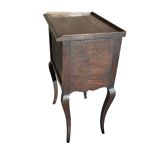 Curtained bedside table