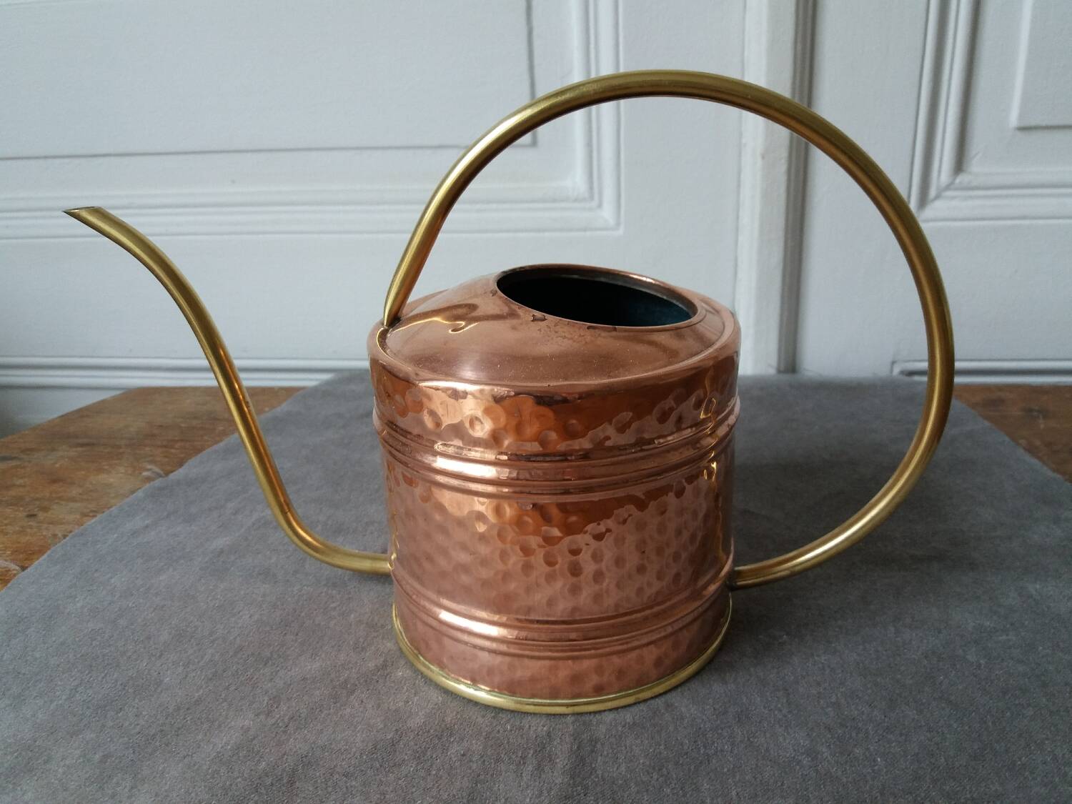 Old hammered copper watering can