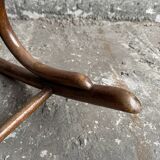 Warm walnut bentwood and cane child's rocking chair early 20th-century