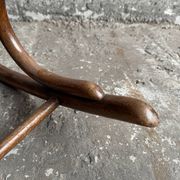 Warm walnut bentwood and cane child's rocking chair early 20th-century
