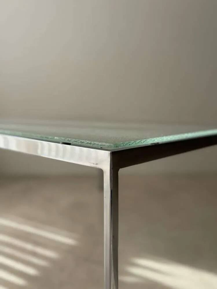 Minimalist 1960s wire glass coffee table in stainless steel.