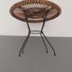 Rattan table with metal leg