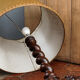 Twisted foot lamp carved in oak