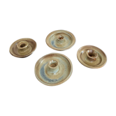 Series of 4 vintage stoneware candle holders