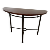Half-moon console grange in solid cherry wood and wrought iron with a glass top.