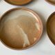 9 assiettes en grès vintage