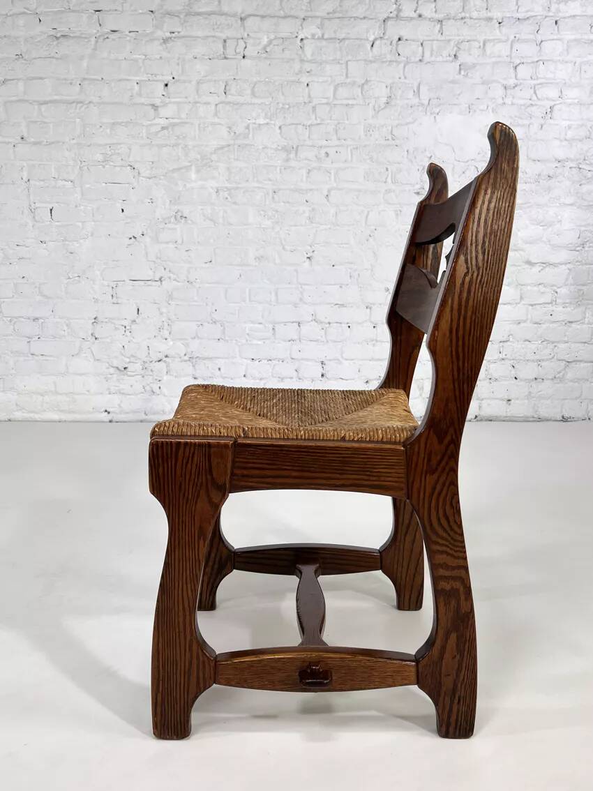 Set of 4 1950s chairs in oak with woven seats.