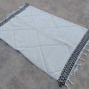 Tapis blanc en laine naturelle