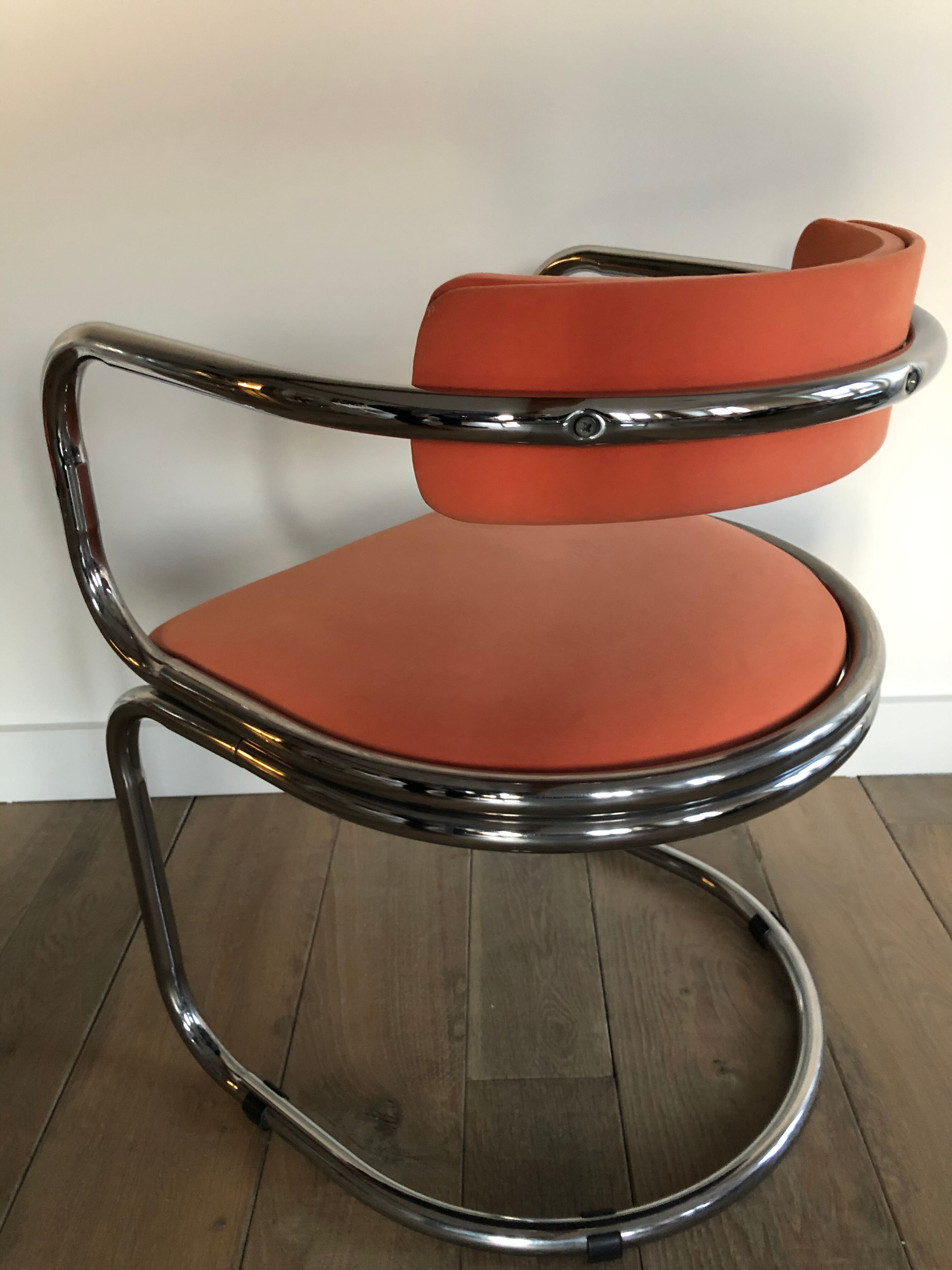 Victoria chair 70s chrome structure and terracotta-colored alacantara fabrics