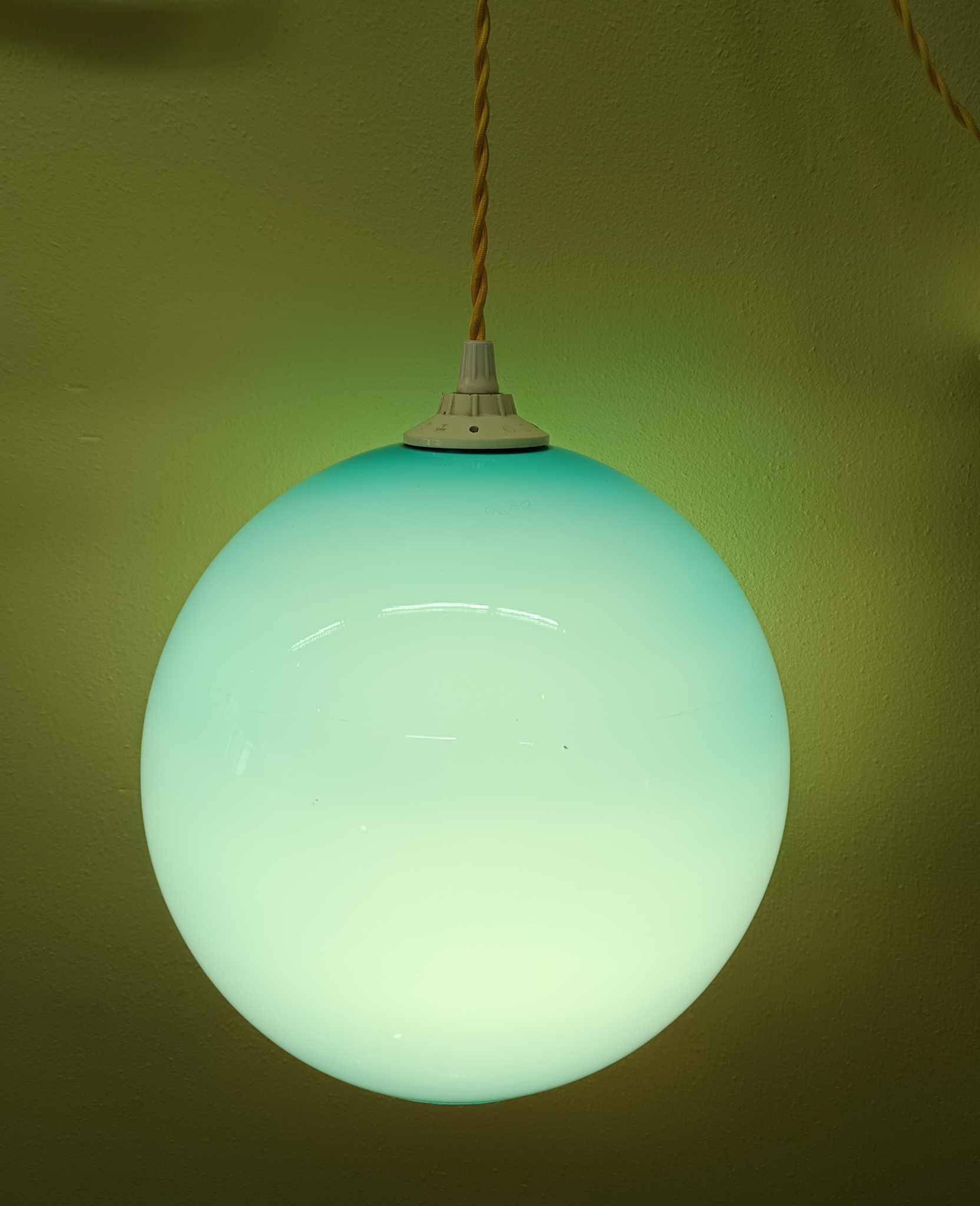 Pair of vintage ball pendant lights circa 1970