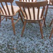 Set of 4 chairs and 1 armchair in mountain style made of oak.